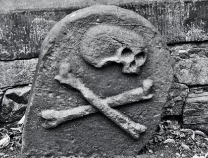 black and white image of a tombstone