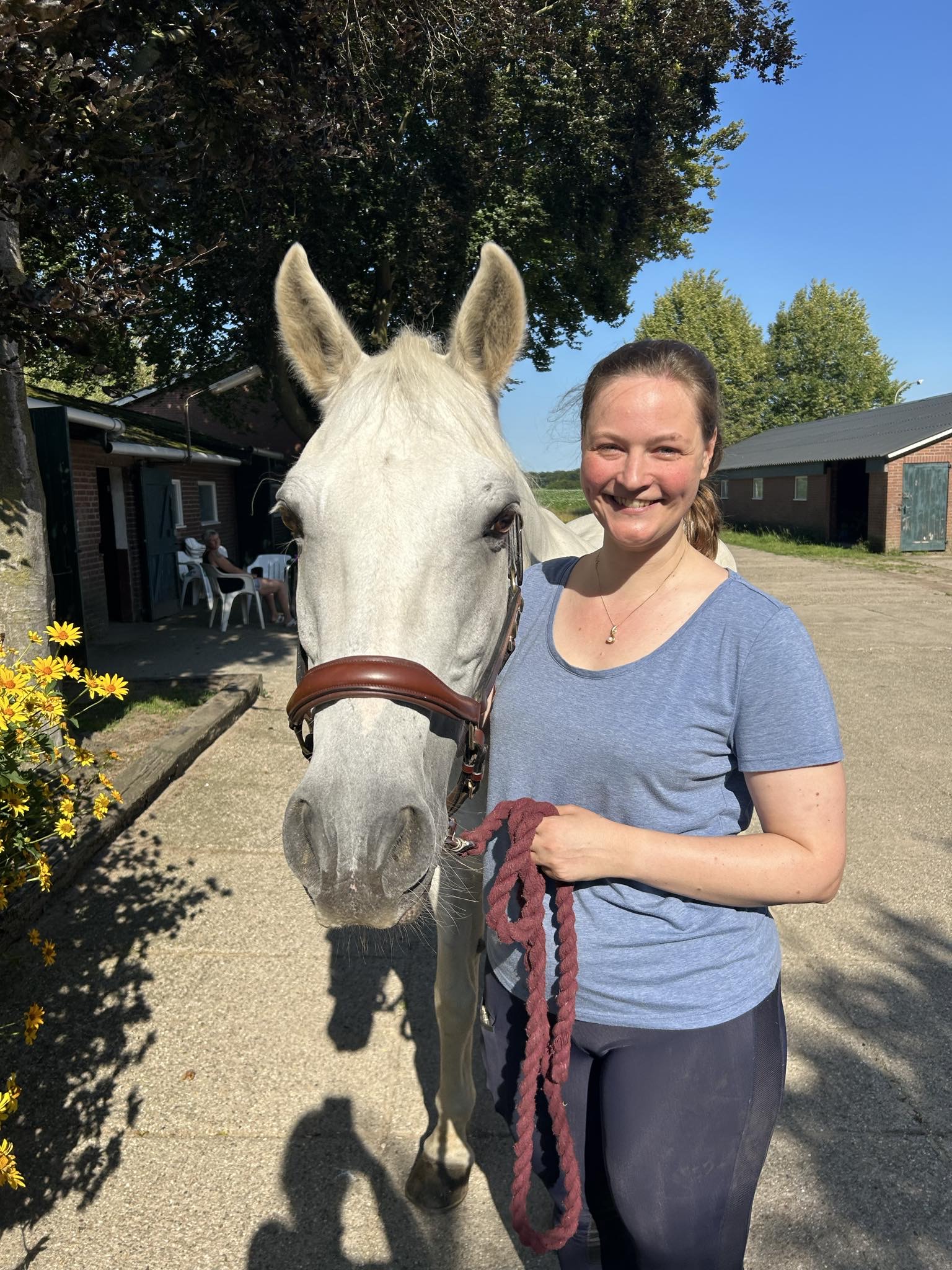Lonneke and a grey horse